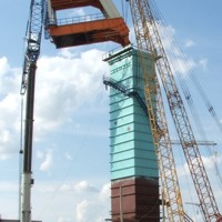 Монтаж оголовка копра массой 106т до отметки 53м. Совместная работа кранов АС 500-1, МКГС-100 и МКГС-100.1