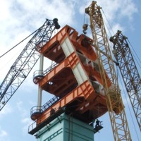 Монтаж оголовка копра массой 106т до отметки 53м. Совместная работа кранов АС 500-1, МКГС-100 и МКГС-100.1